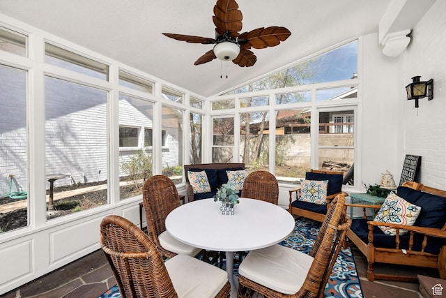 341 E E Blvd, Logan, UT 84321 - sunroom featuring lofted ceiling, stone finish flooring, and ceiling fan
