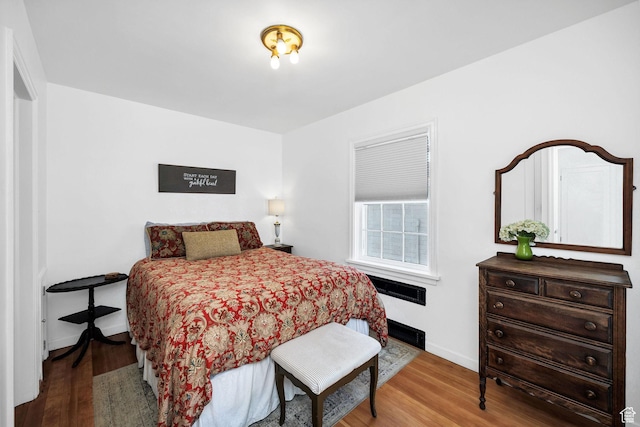 341 E E Blvd, Logan, UT 84321 - bedroom with baseboards and wood finished floors