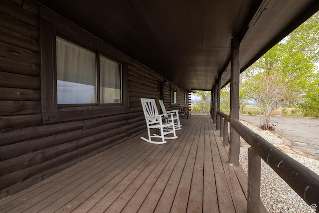 wooden terrace with covered porch