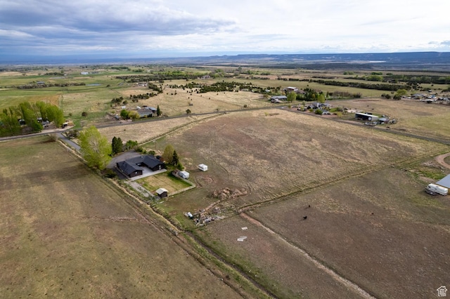 aerial view of property and surrounding area with rural landscape