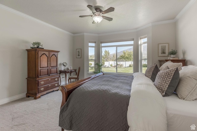 bedroom with baseboards, ceiling fan, a water view, crown molding, and light carpet