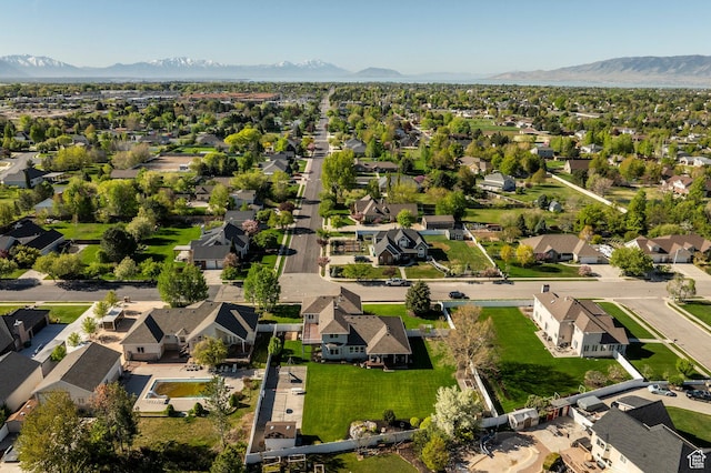 aerial view with a mountain view and a residential view