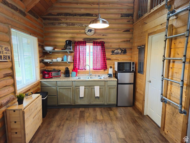 50 E 200 S, Saint Charles, ID 83272 - kitchen with freestanding refrigerator, a sink, light countertops, dark wood finished floors, and vaulted ceiling