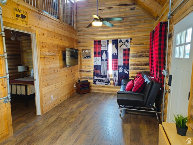 50 E 200 S, Saint Charles, ID 83272 - sitting room with a ceiling fan, hardwood / wood-style floors, high vaulted ceiling, and log walls
