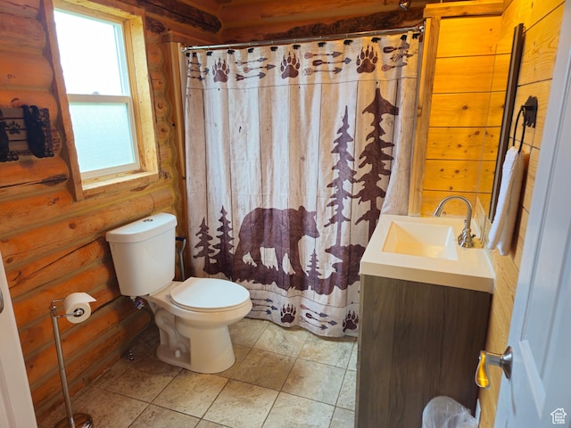 50 E 200 S, Saint Charles, ID 83272 - full bathroom featuring toilet, vanity, tile patterned flooring, curtained shower, and rustic walls