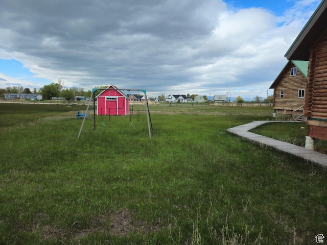 50 E 200 S, Saint Charles, ID 83272 - view of grassy yard with an outdoor structure and a storage unit