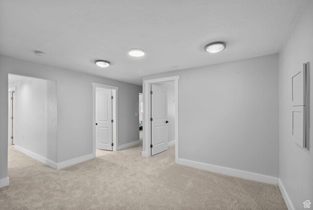 11549 S Equestrian Dr W, South Jordan, UT 84095 - empty room featuring light carpet and baseboards