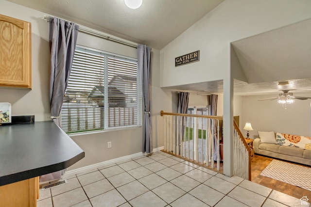 883 W 660 S, Tooele, UT 84074 - dining space with baseboards, ceiling fan, and high vaulted ceiling