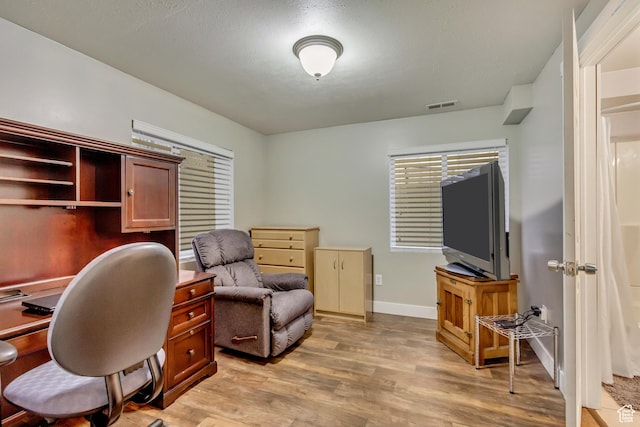 883 W 660 S, Tooele, UT 84074 - office with light wood finished floors, visible vents, and baseboards