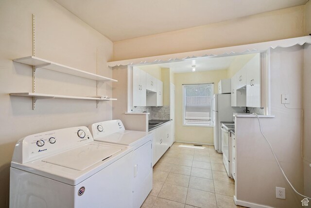 370 E Scott Ave, South Salt Lake, UT 84115 - washroom with laundry area, light tile patterned floors, and independent washer and dryer