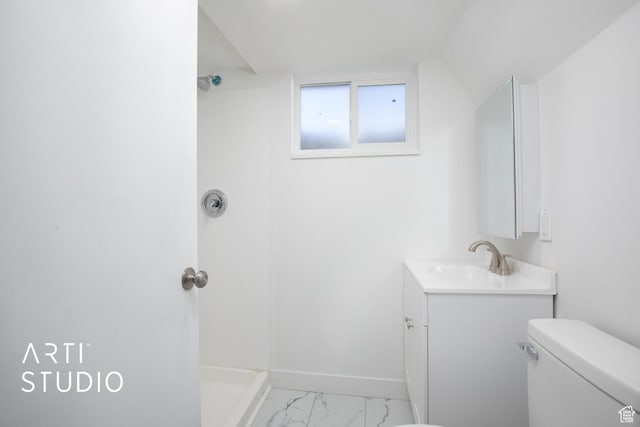 full bath featuring toilet, baseboards, walk in shower, marble finish floor, and vanity