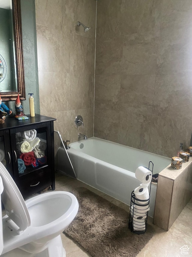 full bathroom featuring tile patterned flooring and bathtub / shower combination