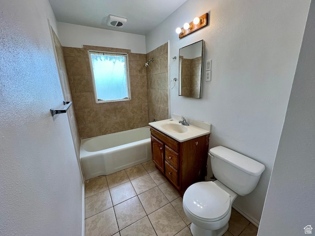 bathroom featuring toilet, tile patterned flooring, vanity, and shower / bathing tub combination