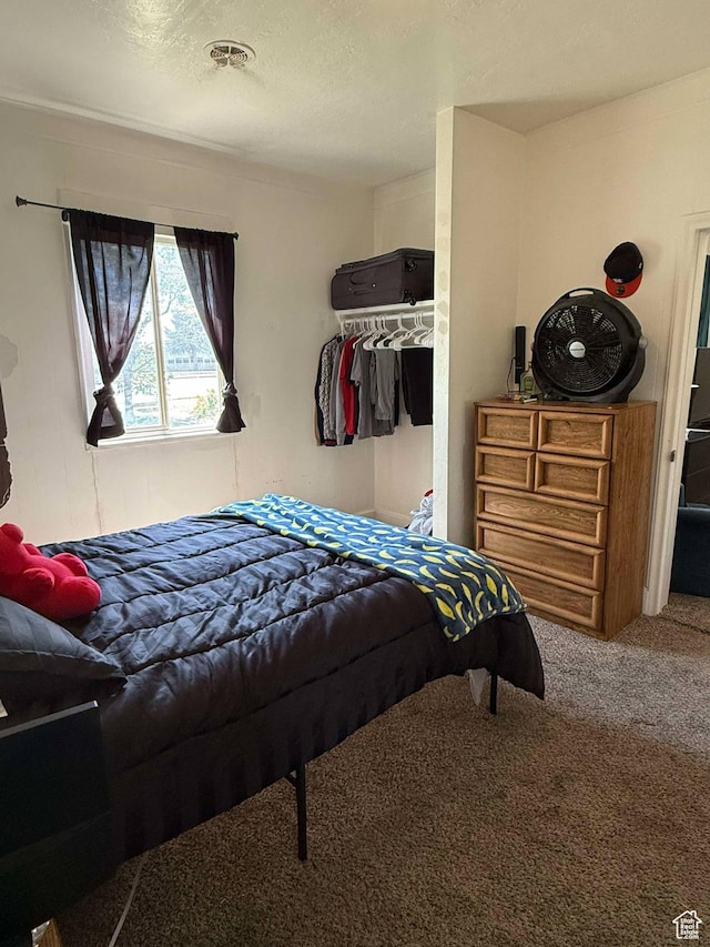3274 W 3100 S, West Valley City, UT 84119 - bedroom with a textured ceiling and carpet floors