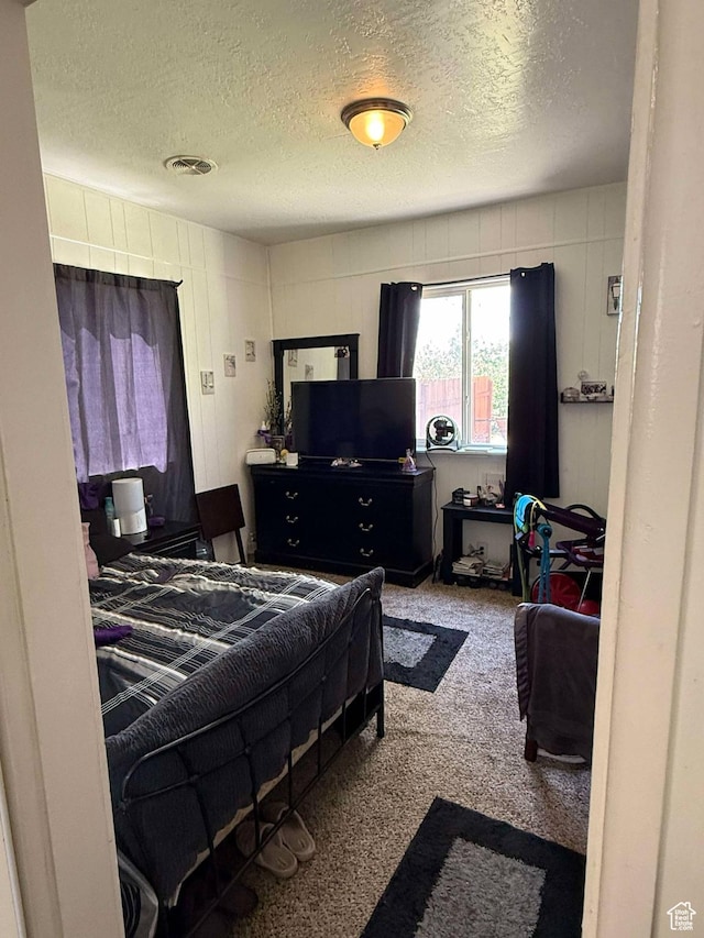 3274 W 3100 S, West Valley City, UT 84119 - bedroom with carpet, a textured ceiling, and visible vents