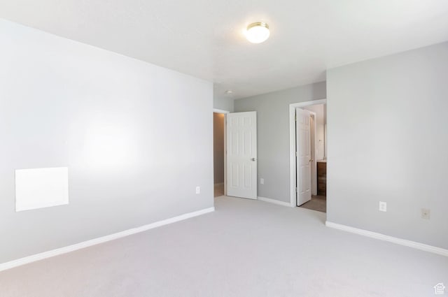 770 N Quincy Ave, Ogden, UT 84404 - spare room featuring light colored carpet and baseboards