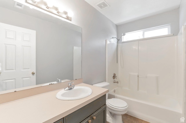 770 N Quincy Ave, Ogden, UT 84404 - full bathroom with toilet, visible vents, shower / bathing tub combination, and vanity