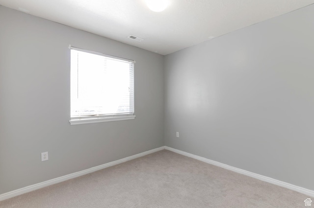 770 N Quincy Ave, Ogden, UT 84404 - unfurnished room with baseboards, light carpet, and visible vents