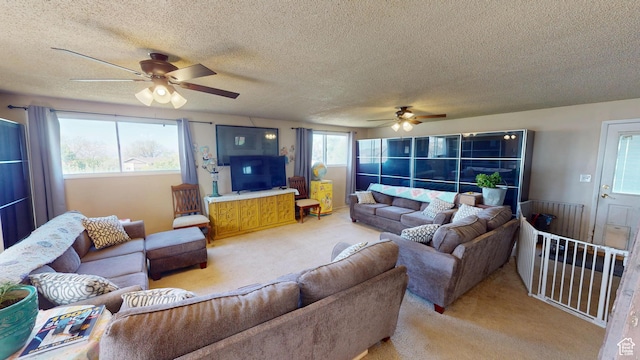 983 E Antelope Dr N, Layton, UT 84040 - living room featuring ceiling fan, light colored carpet, and a textured ceiling