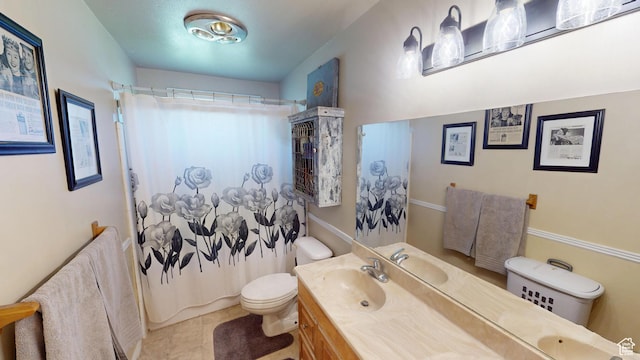 983 E Antelope Dr N, Layton, UT 84040 - bathroom featuring toilet, vanity, shower / tub combo with curtain, and tile patterned flooring