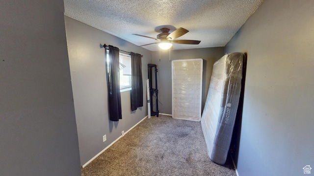 983 E Antelope Dr N, Layton, UT 84040 - corridor with carpet floors, a textured ceiling, and baseboards