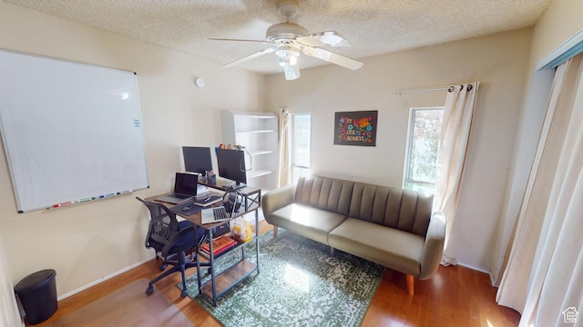 983 E Antelope Dr N, Layton, UT 84040 - office area featuring wood finished floors, a ceiling fan, baseboards, and a textured ceiling