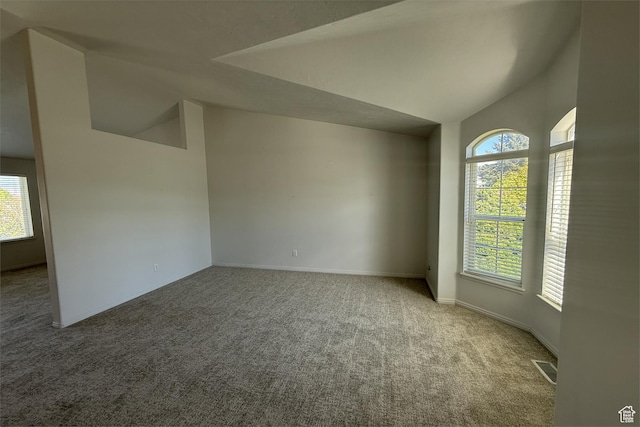 166 E Cove Rd, Saratoga Springs, UT 84045 - empty room featuring lofted ceiling, healthy amount of natural light, carpet, and baseboards