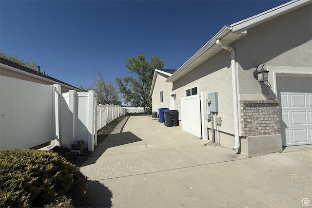 166 E Cove Rd, Saratoga Springs, UT 84045 - view of side of home featuring stucco siding