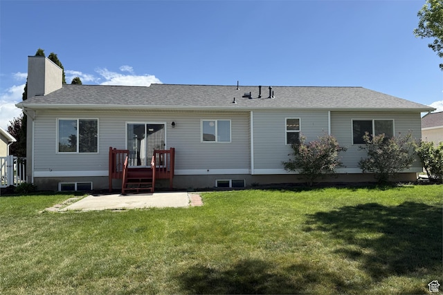 166 E Cove Rd, Saratoga Springs, UT 84045 - rear view of house featuring a chimney, a patio, a yard, and roof with shingles