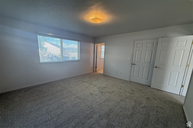 166 E Cove Rd, Saratoga Springs, UT 84045 - unfurnished bedroom with carpet and baseboards