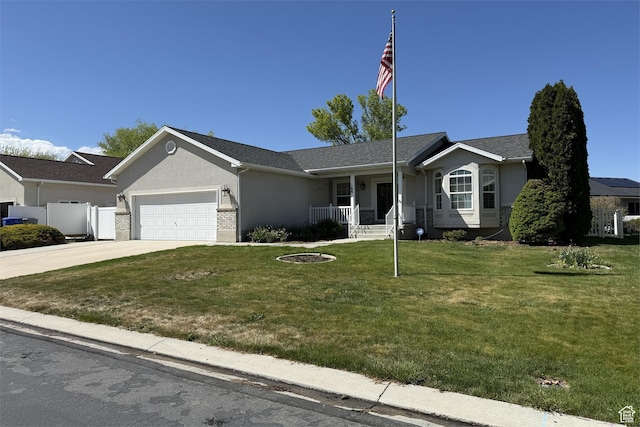 166 E Cove Rd, Saratoga Springs, UT 84045 - ranch-style house with a garage, covered porch, a front yard, stucco siding, and concrete driveway