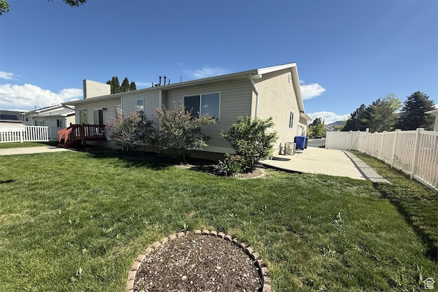 166 E Cove Rd, Saratoga Springs, UT 84045 - view of side of property featuring a patio and a wooden deck