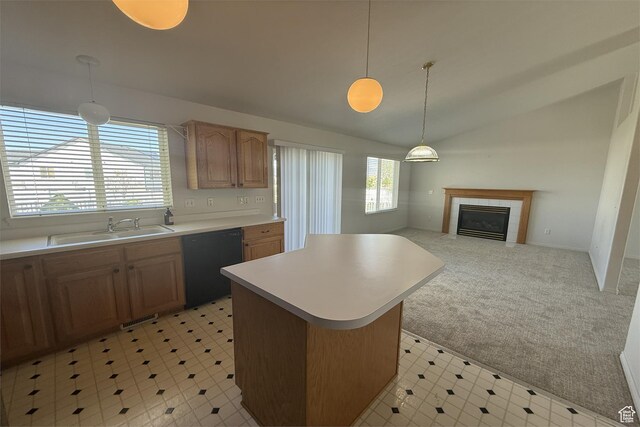 166 E Cove Rd, Saratoga Springs, UT 84045 - kitchen with dishwasher, a sink, a kitchen island, light countertops, and a fireplace