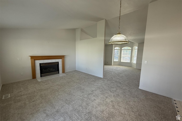 166 E Cove Rd, Saratoga Springs, UT 84045 - unfurnished living room featuring a fireplace, carpet flooring, high vaulted ceiling, and baseboards