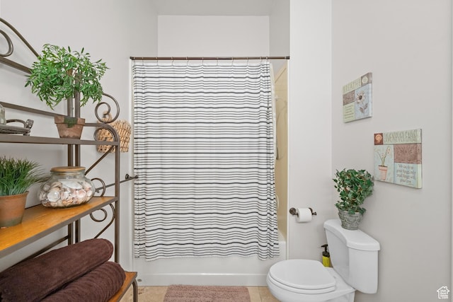 full bathroom with toilet and shower / bath combination with curtain