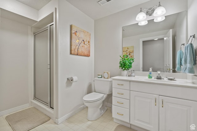 bathroom with toilet, a stall shower, visible vents, baseboards, and vanity