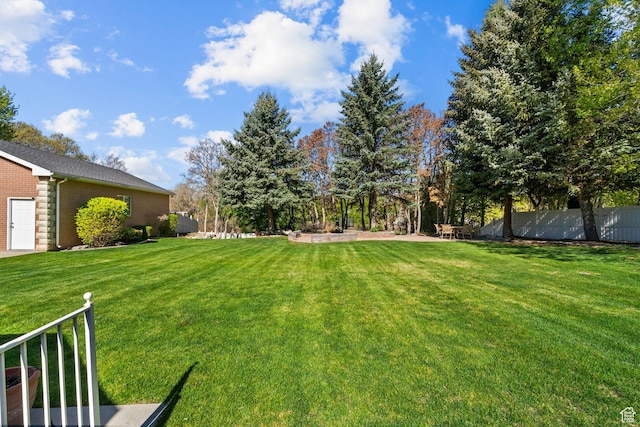 view of yard with fence