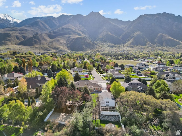 aerial view featuring a mountain view and a residential view