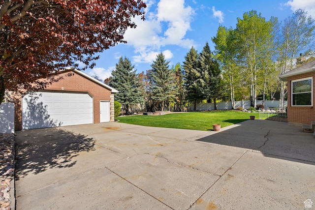 exterior space featuring an outbuilding and fence