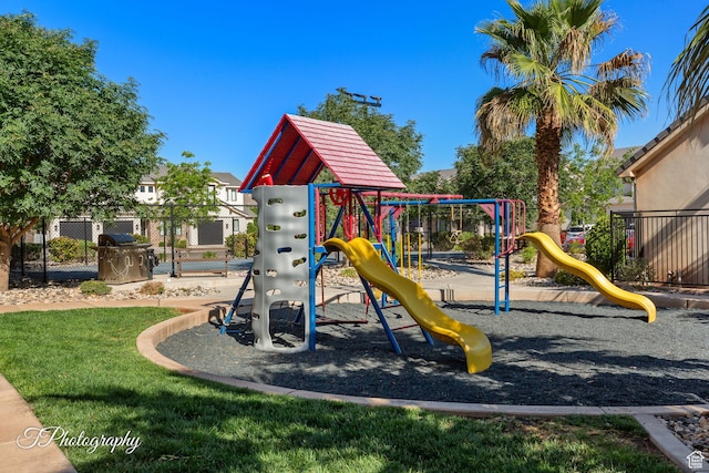 community playground featuring fence