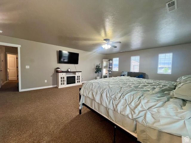 642 W Mulberry St, Stansbury Park, UT 84074 - bedroom featuring carpet flooring, visible vents, baseboards, and a ceiling fan