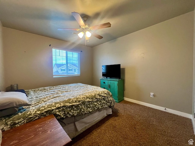 642 W Mulberry St, Stansbury Park, UT 84074 - carpeted bedroom featuring baseboards and a ceiling fan