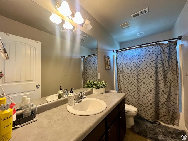 642 W Mulberry St, Stansbury Park, UT 84074 - bathroom featuring toilet, vanity, visible vents, and a shower with shower curtain