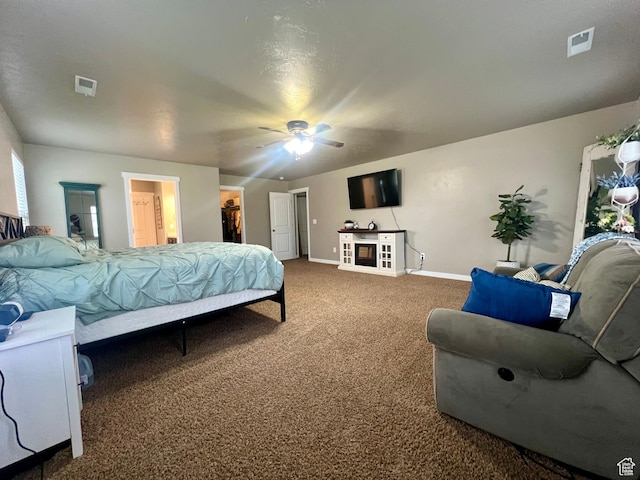 642 W Mulberry St, Stansbury Park, UT 84074 - bedroom with visible vents, baseboards, a walk in closet, and carpet floors