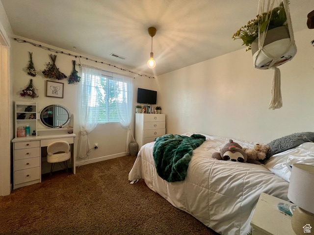 642 W Mulberry St, Stansbury Park, UT 84074 - carpeted bedroom with baseboards and visible vents