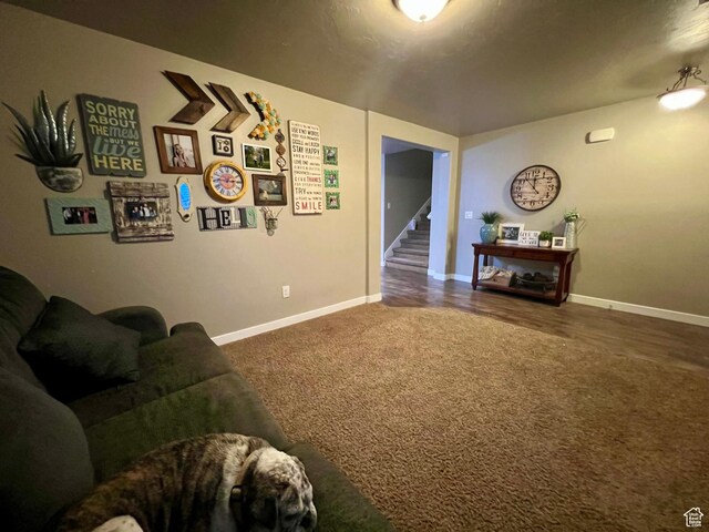 642 W Mulberry St, Stansbury Park, UT 84074 - living area featuring stairway, carpet flooring, and baseboards