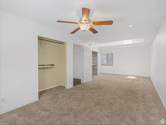 601 E Valley Dr, Heber City, UT 84032 - unfurnished bedroom featuring a skylight, carpet floors, a closet, and a ceiling fan