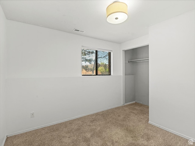 601 E Valley Dr, Heber City, UT 84032 - unfurnished bedroom with baseboards, a closet, visible vents, and carpet floors