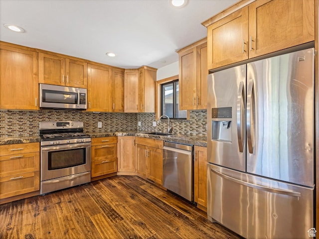 601 E Valley Dr, Heber City, UT 84032 - kitchen featuring recessed lighting, dark wood finished floors, a sink, decorative backsplash, and appliances with stainless steel finishes
