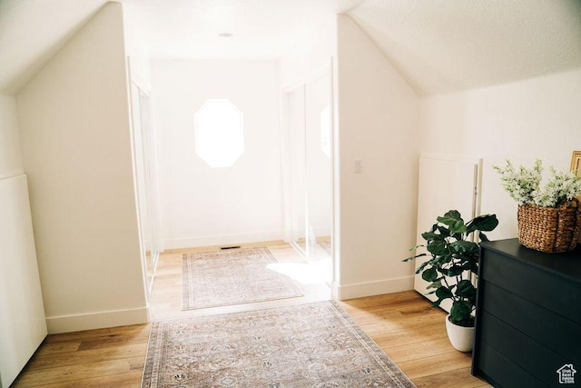 290 W 300 N, Beaver, UT 84713 - additional living space featuring light wood finished floors, lofted ceiling, and baseboards